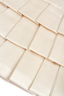 Creamy white Dranka corset top by Podyh featuring structured design and satin finish, shown on a neutral background.