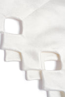 PODYH Tyman eggshell midi dress displayed on a hanger, showcasing its elegant design and soft fabric in a neutral color.