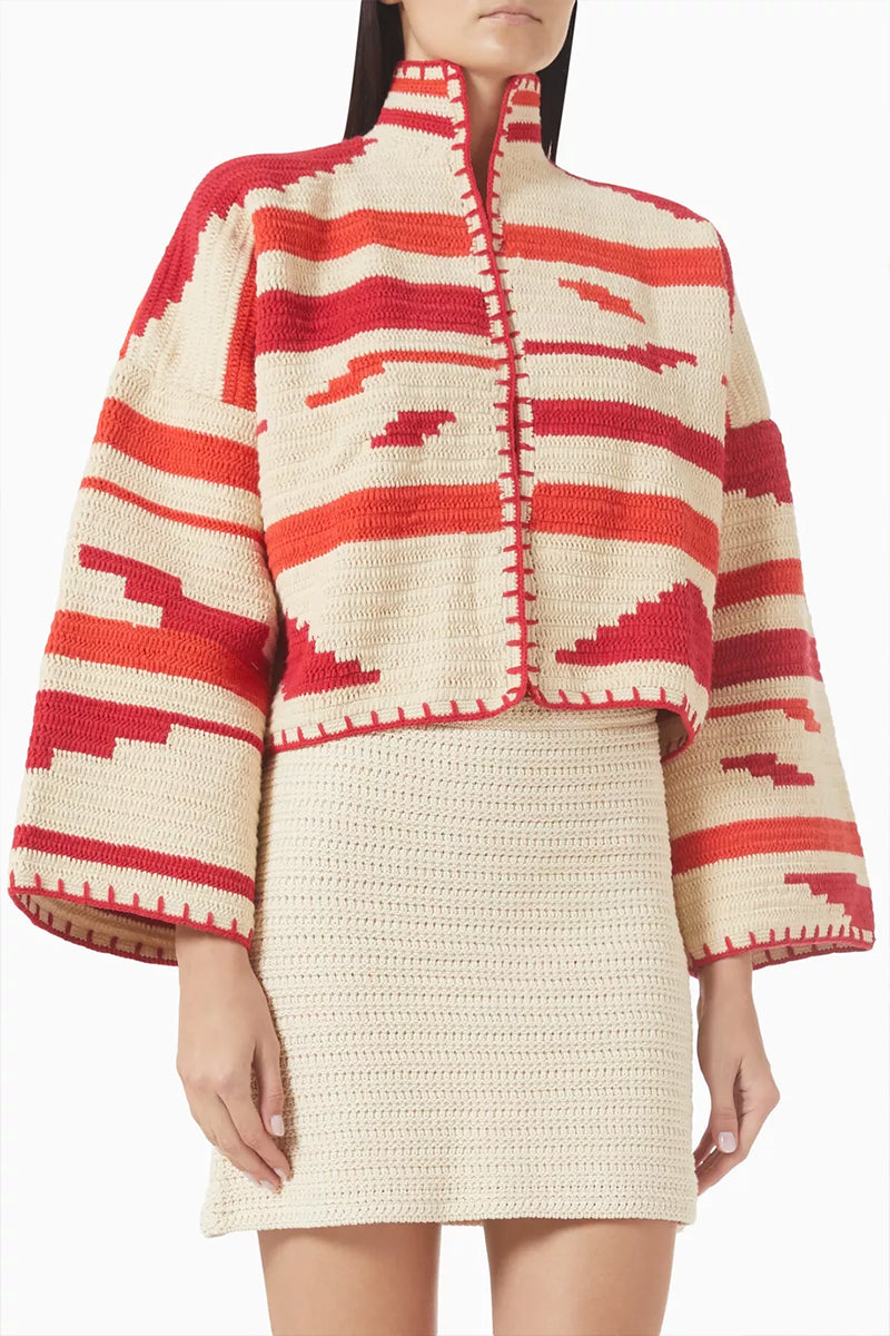 Jessica K Kiona cardigan in beige and red, soft knit fabric with button closure and stylish color block design.