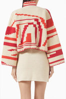 Jessica K Kiona cardigan in beige and red, featuring a stylish design with a comfortable fit and cozy knit texture.