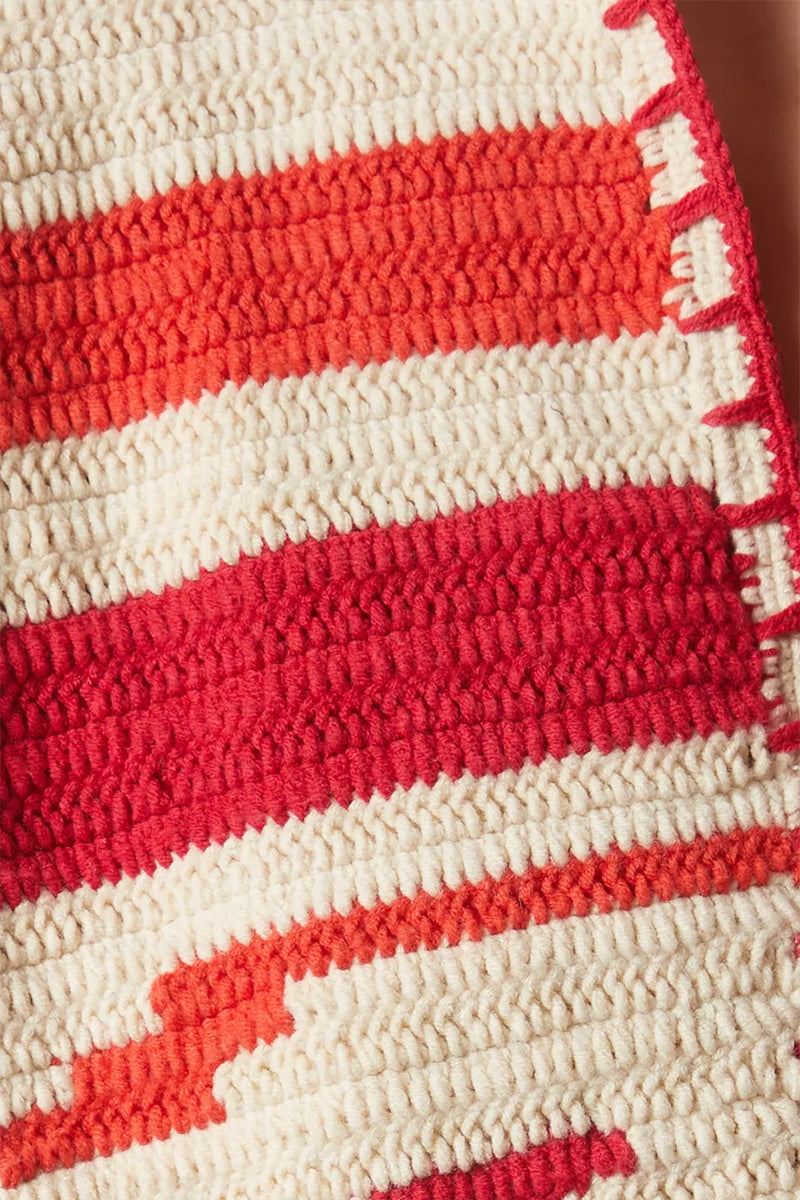 Jessica K Kiona cardigan in beige and red, showing the stylish color-block design and soft knit texture.