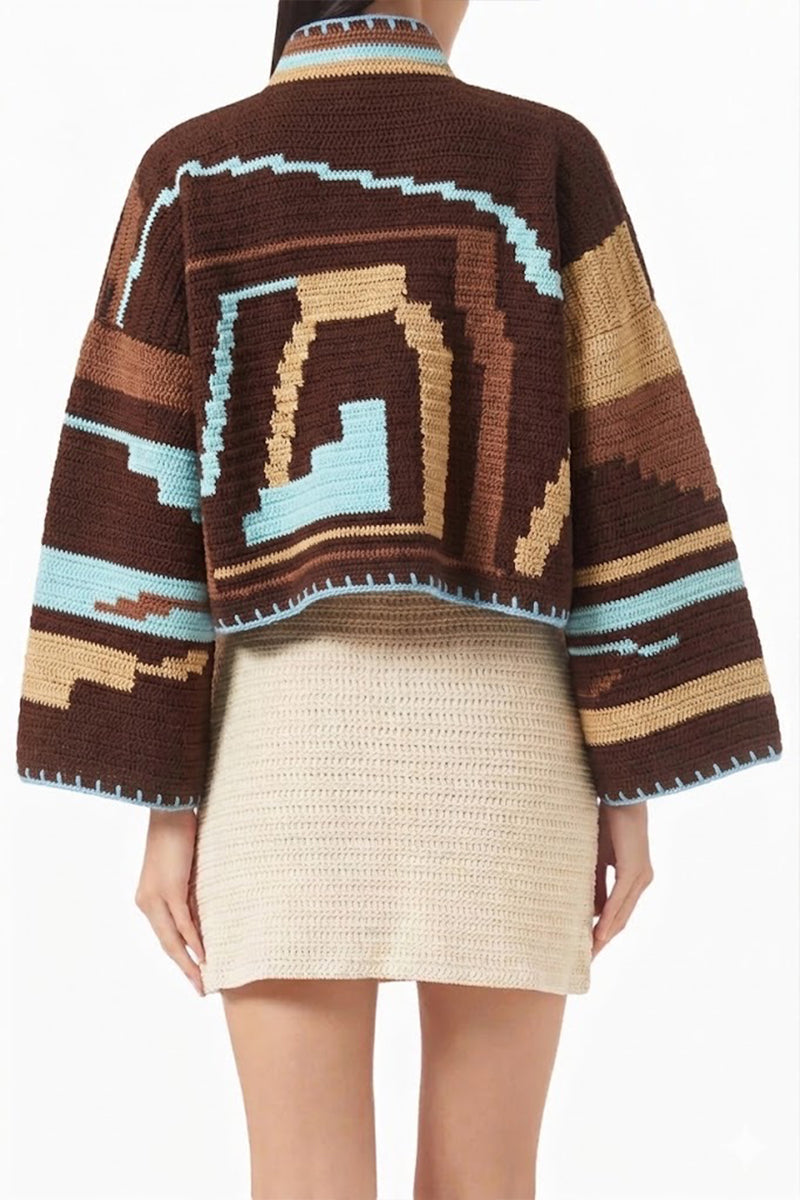 Jessica K KIONA cardigan in brown and aqua, soft knit with a relaxed fit, displayed on a hanger.