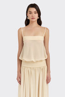 Beige satin Kaia maxi dress by Stolen Stores, flowing chiffon fabric, elegant length, perfect for formal or special occasions.