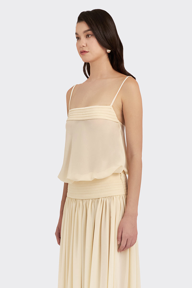 Beige satin maxi dress by Stolen Stores, featuring a flowing chiffon design ideal for elegant occasions.