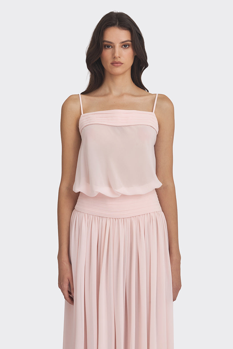 Light pink Kaia chiffon maxi dress by Stolen Stores, flowing fabric and elegant design perfect for summer events.