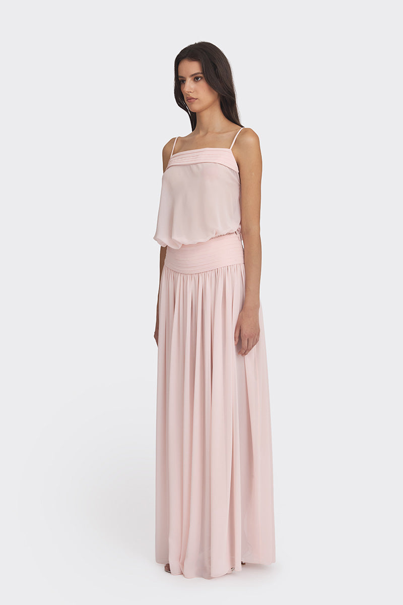 Light pink Kaia chiffon maxi dress by Stolen Stores, flowing fabric with a graceful, elegant silhouette.