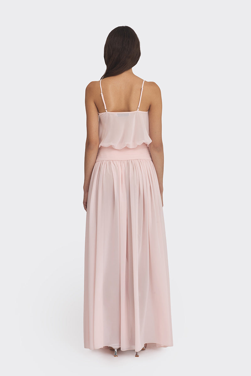 Light pink Kaia chiffon maxi dress by Stolen Stores, flowing fabric, full-length design, elegant and feminine for special occasions.