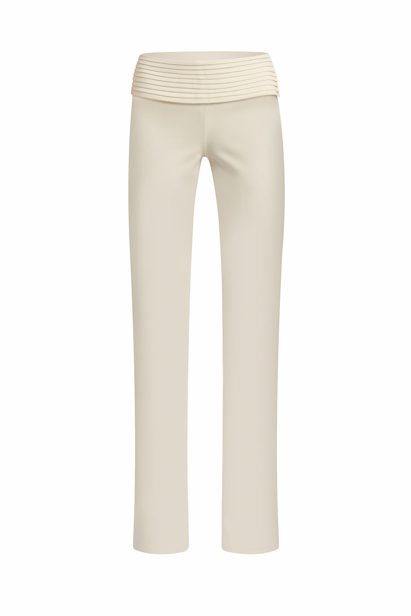 Stolen Stores Kaia ivory white pants featuring a relaxed fit and tailored design, displayed on a model.