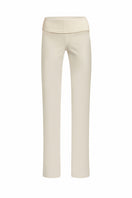 Stolen Stores Kaia ivory white pants featuring a relaxed fit and tailored design, displayed on a model.
