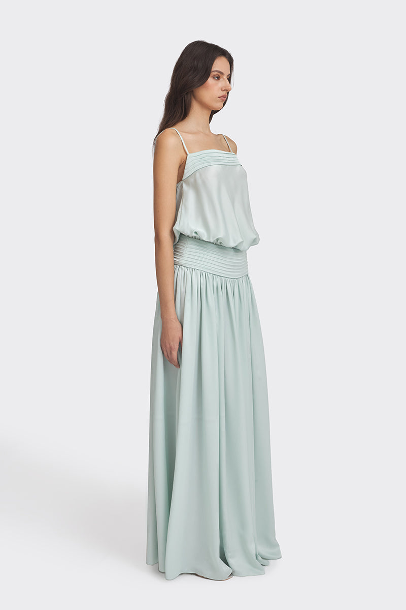 Light green satin Kaia maxi dress by Stolen Stores, flowing design with elegant fabric and stylish silhouette.
