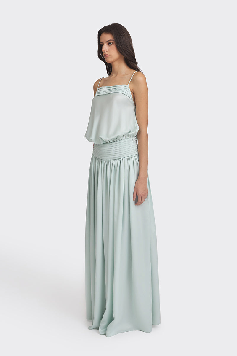Light green satin maxi dress from Stolen Stores, featuring a flowing silhouette and elegant design.