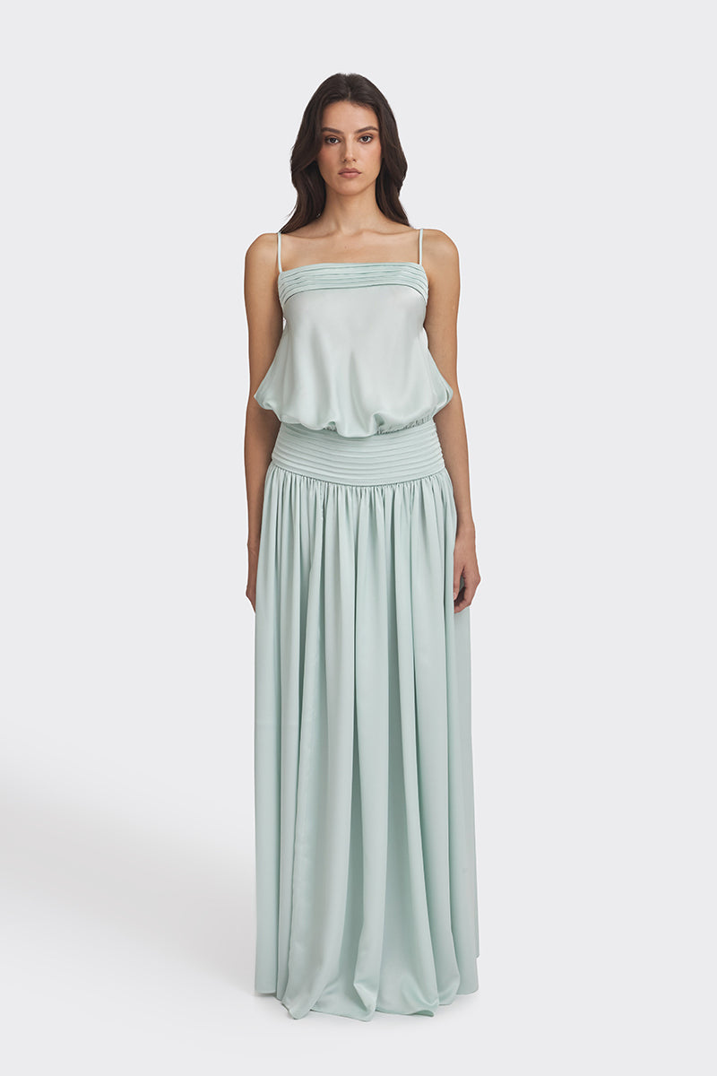 Light green satin maxi dress by Stolen Stores, featuring a flowing silhouette and elegant design.
