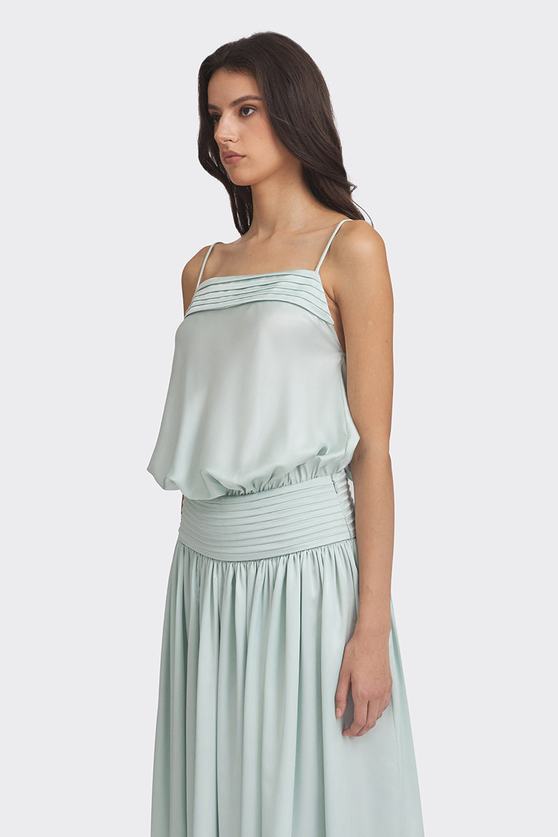 Light green satin maxi dress by Stolen Stores, featuring a flowing silhouette and elegant design, perfect for formal occasions.