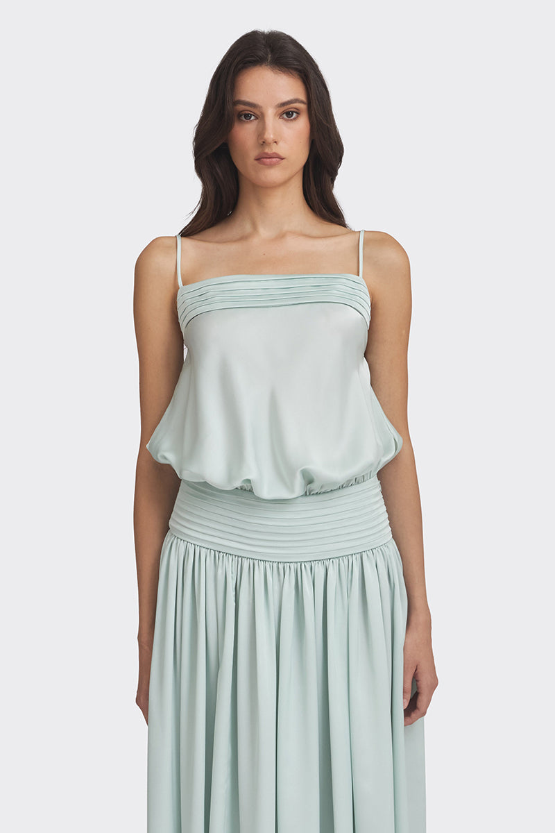 Light green satin maxi dress by Stolen Stores, featuring a flowing design and elegant style, perfect for special occasions.