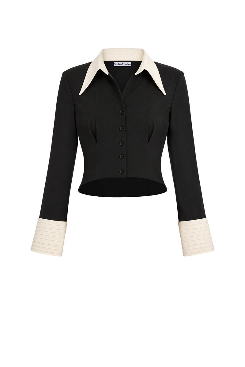 Black Stolen Stores Kaia shirt, a stylish women’s top with a relaxed fit and minimalist design, shown in black and white.