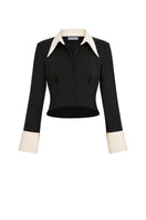 Black Stolen Stores Kaia shirt, a stylish women’s top with a relaxed fit and minimalist design, shown in black and white.