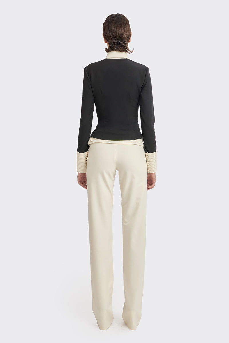 Black Kaia shirt by Stolen Stores, stylish top with a sleek design, shown in a black and white color scheme on a model.