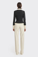 Black Kaia shirt by Stolen Stores, stylish top with a sleek design, shown in a black and white color scheme on a model.