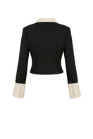 Black KAIA shirt from Stolen Stores, featuring a stylish top design with subtle white accents and a modern fit.