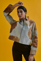 ZUT KANAO leather jacket in toffee cowhide with a tailored fit and classic collar, displayed on a hanger.