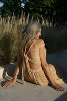 Kasia Kulenty Aphrodite co-ords set in sandy beige, featuring a fitted top and matching wide-leg pants, stylish and comfortable.
