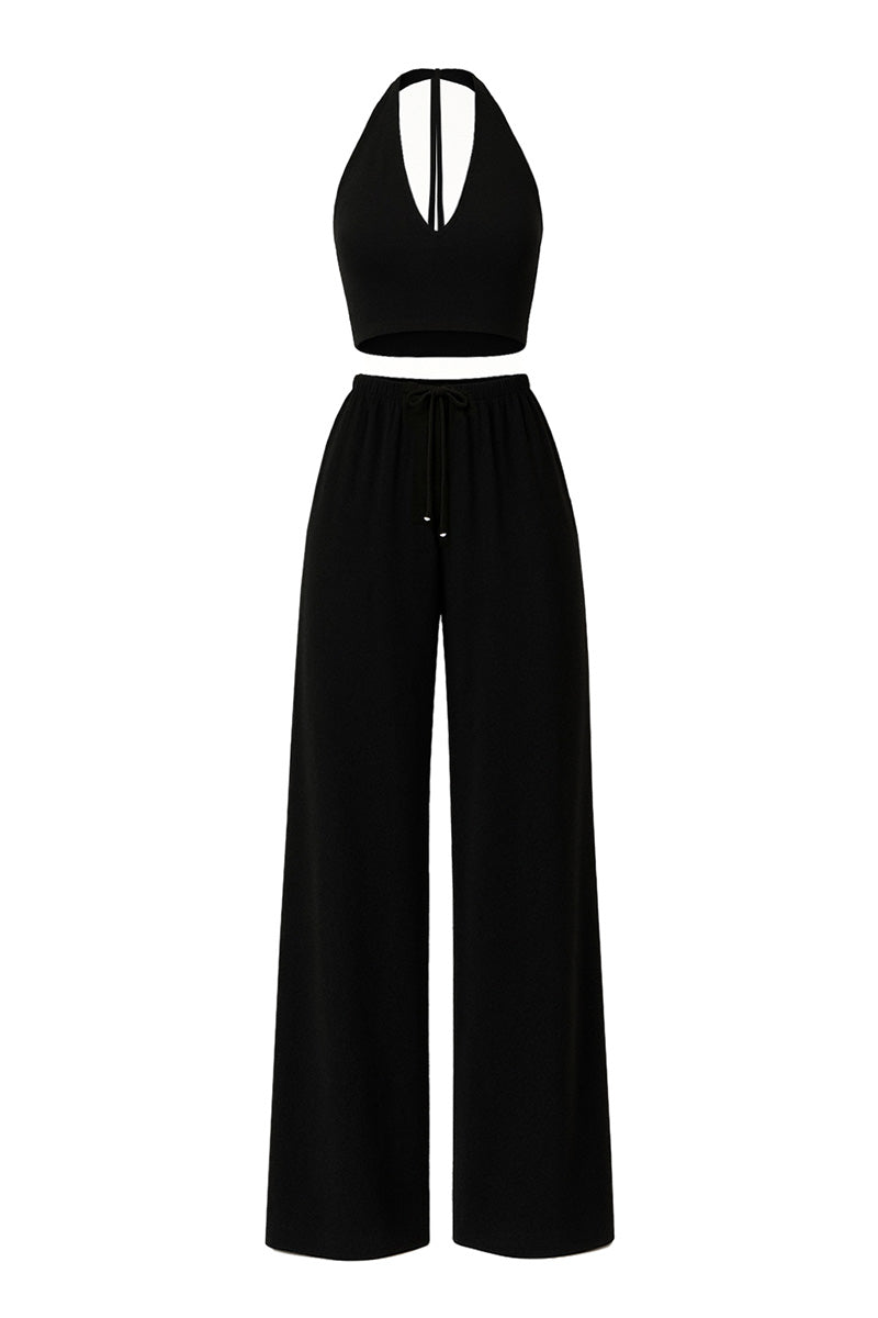 Black Kayla co-ord set by Khanum's, featuring a matching top and bottom laid flat, stylish and versatile for everyday wear.