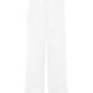 White Keep Pants by Khanum's featuring a relaxed fit and stylish design, shown on a model in a casual indoor setting.