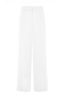 White Keep Pants by Khanum's featuring a relaxed fit and stylish design, shown on a model in a casual indoor setting.