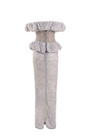 Silver keepsake gown by Yassmin Saleh with ghost back design, elegant and flowing fabric for formal occasions.
