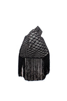 Black keffiyeh slip clutch bag with fringes by Sarah's Bag, stylish compact accessory for evening or casual wear.