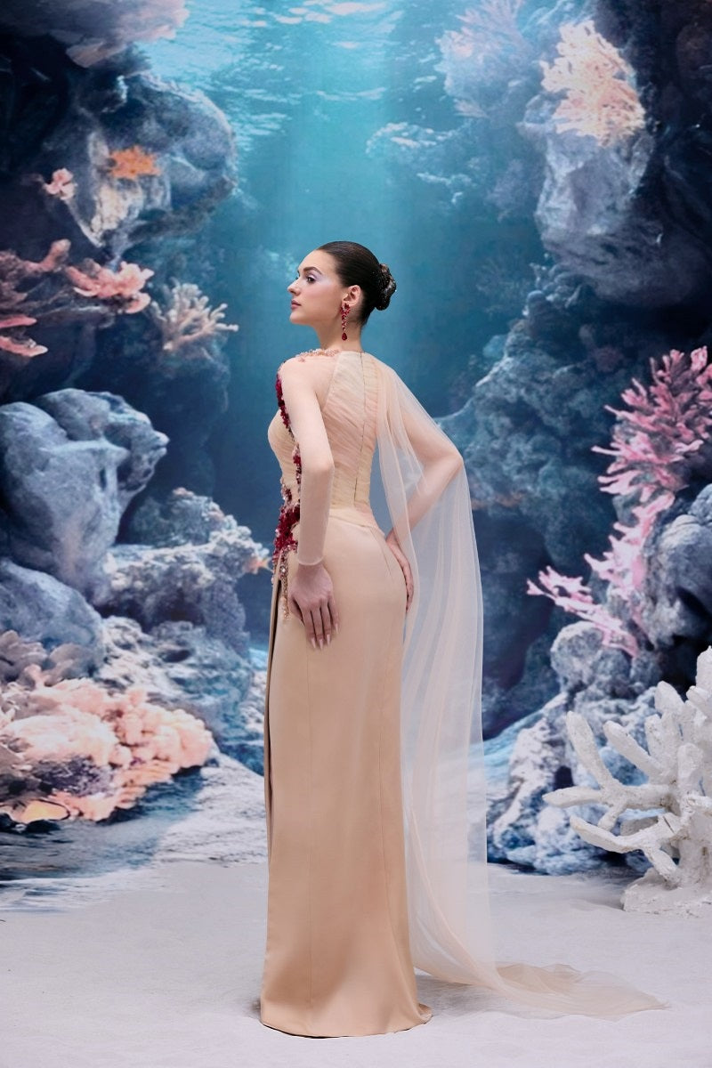 Beige Irena tulle and silk taffeta gown by 21Six, featuring elegant flowing fabric and sophisticated design.