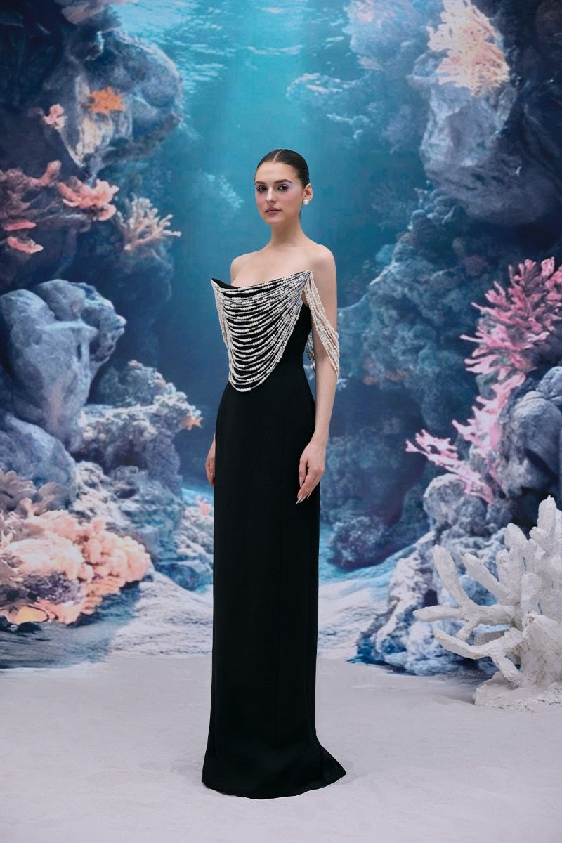Black Noelle crepe gown by 21Six, elegant floor-length dress with a fitted silhouette and sleek fabric design.
