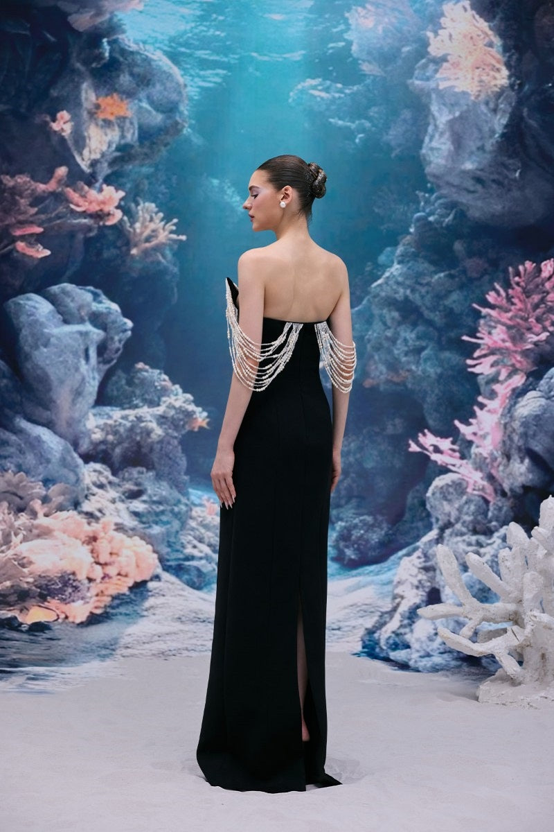 Black Noelle crepe gown by 21Six, elegant floor-length dress with a fitted bodice and flowing skirt, perfect for formal occasions.