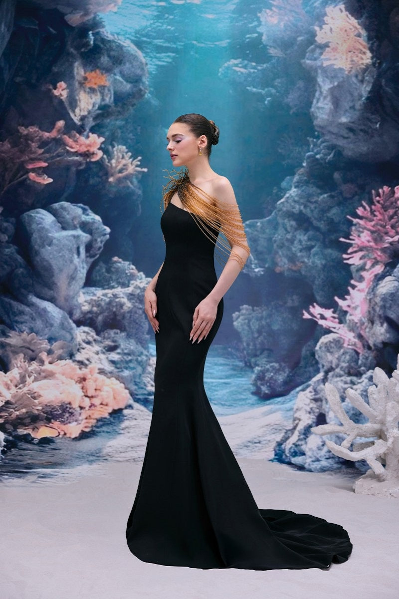 Black Thalia crepe gown by 21Six, featuring elegant fabric and a sophisticated silhouette, shown on a model.