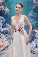 Elegant white Evelina royal taffeta gown by 21Six, featuring a flowing design and intricate details for formal occasions.