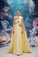 Lyssandra royal taffeta gown in pale yellow by 21Six, showcasing elegant fabric and flowing design for formal occasions.