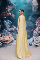 Elegant pale yellow taffeta gown by 21Six, the Lysandra Royal Taffeta Dress featuring a flowing, luxurious design.