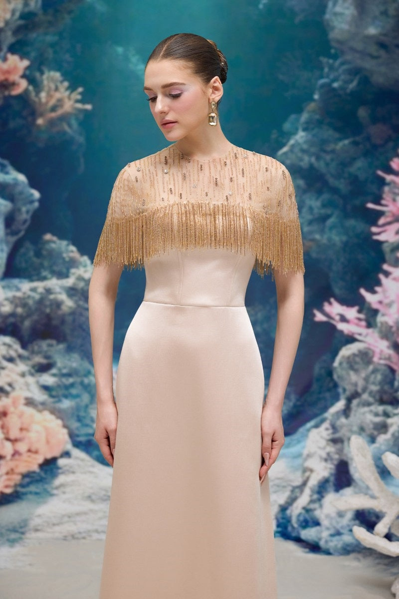 Beige Marcelline silk taffeta and tulle gown by 21Six, elegant formal dress with intricate fabric details and flowing silhouette.