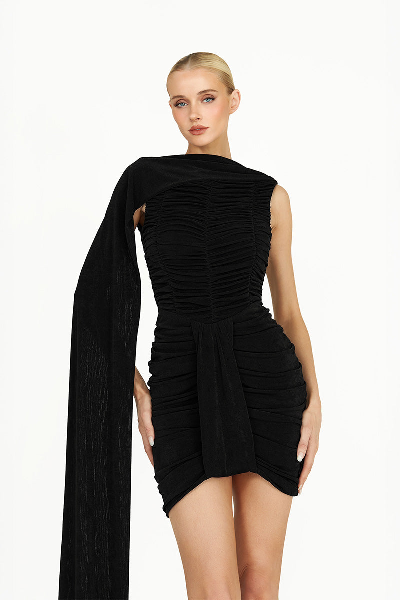 Black Kemmiye mini dress by Khanum's, shown on a hanger with a close-up of the fabric and stylish design details.