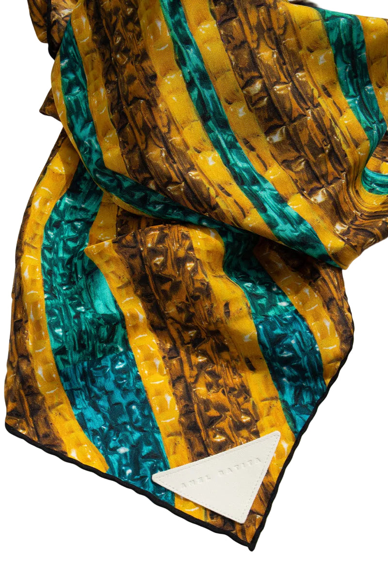 Elegant silk Khamon Brocot scarf by Amel Batita featuring intricate patterns and vibrant colors, displayed close-up detail.
