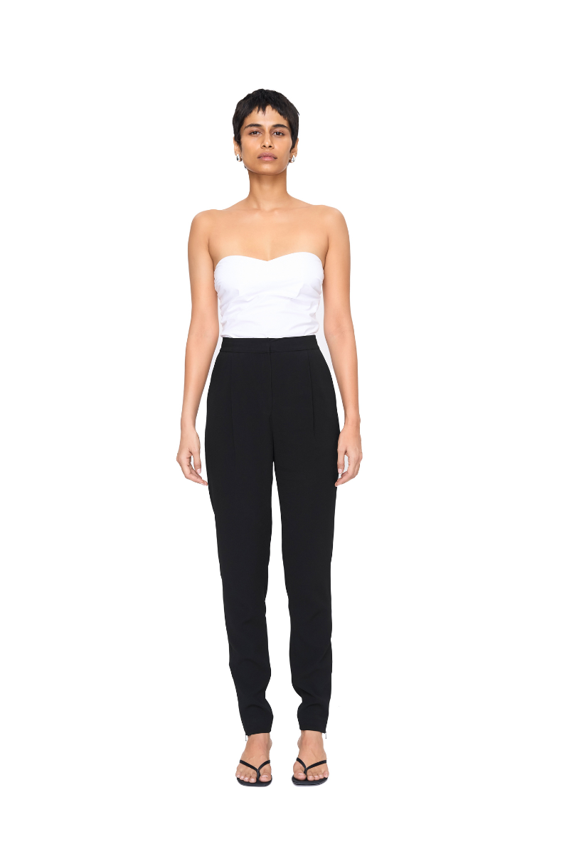 Black URA Kia pants shown from the front, featuring a tailored fit with belt loops and classic style for versatile wear.