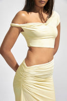 Deme By Gabriella Kira Butter Yellow co-ord set featuring a matching top and skirt, stylish and vibrant for a trendy look.