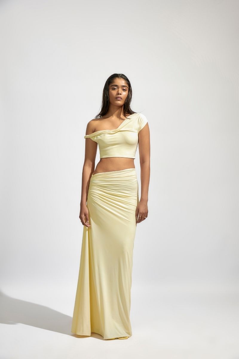 Deme By Gabriella Kira yellow co-ord set featuring a sleeveless top and matching skirt, perfect for casual or summer wear.
