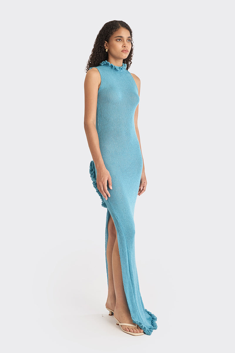 Blue knit low-back maxi dress by Stolen Stores, featuring a flowy silhouette and stylish slip design.