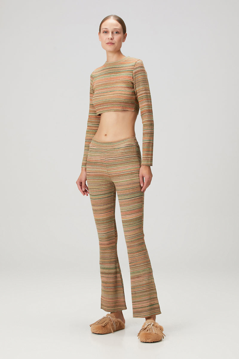 Striped knit crop top from Bassigue, featuring a stylish design, short sleeves, and a fitted silhouette.