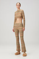 Striped knit crop top by Bassigue featuring a fitted style and short sleeves, perfect for casual or trendy outfits.