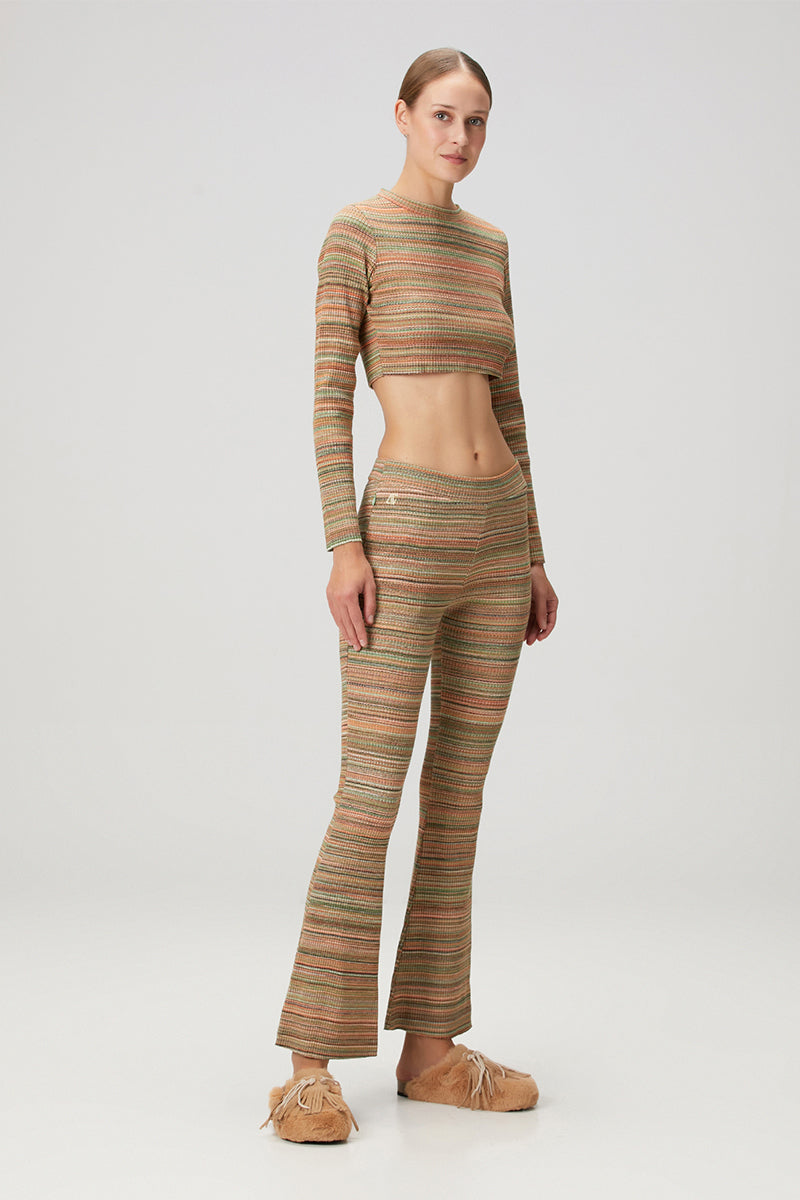 Striped knit flare sweatpants by Bassigue featuring a relaxed fit and casual style, shown in a close-up of the fabric and design.