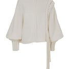 Ivory knitted sweater with long braided details from MAZ Manuela Álvarez, cozy and stylish for casual wear.