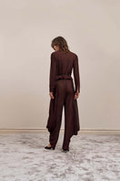Back view of YASSMIN SALEH Knot Pants in brown, stylish pants with a distinctive knot detail at the waist.