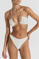 Seaquelle knot bikini top and twisted bikini bottom in creme white, featuring stylish design and comfortable fit.